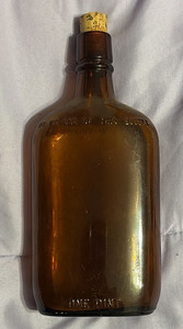 Brown/Amber Glass One Pint Liquor Bottle w/ Cork Top, Embossed Federal Law