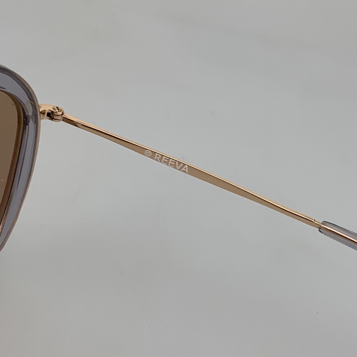Reeva Gold Aviator Sunglasses Revo | Relay Women main image 2