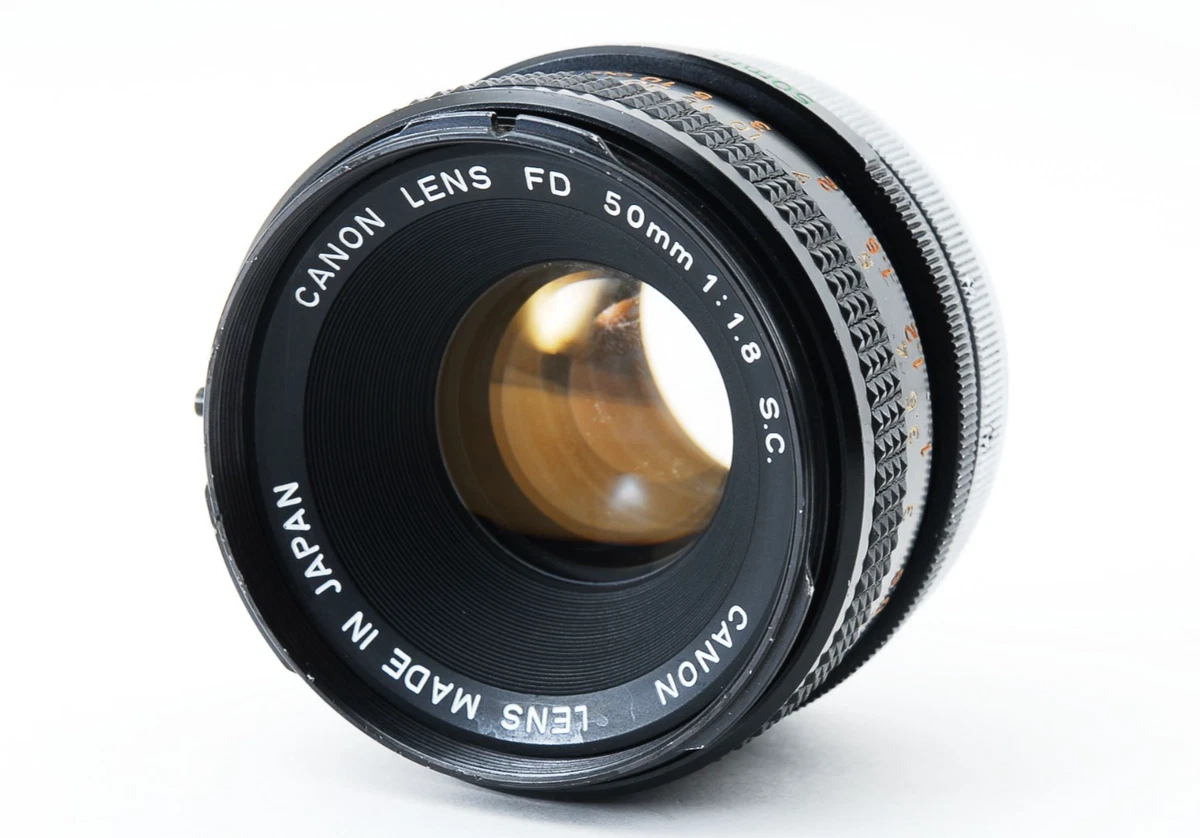 ストラップ付き美品 Canon A-1 + New FD 50mm F/1.8 ストラップ付き美品 Canon A-1 + New FD 50mm F/1.8 フイルムカメラ