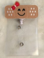 Smiley Face Bandaid Nurses Dr. Retractable ID Card Holder Red Bow Pocket Clip