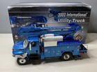 First Gear 2002 International 4400 Utility Truck w/Bucket - Blue - 1:34 Diecast