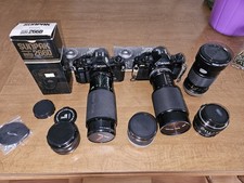 Canon 35 mm Film Cameras 2 A-1 Models Extra Lenses Manuals Sunpak Lot Vintage