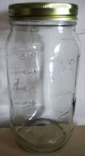 Measuring graded clear glass jar 7" tall about 2 1/2 cups or 20oz  gold tone lid