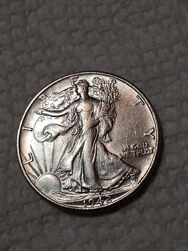 1942 Walking Liberty Half Dollar In Fine To VF Shape In My Opinion. #401