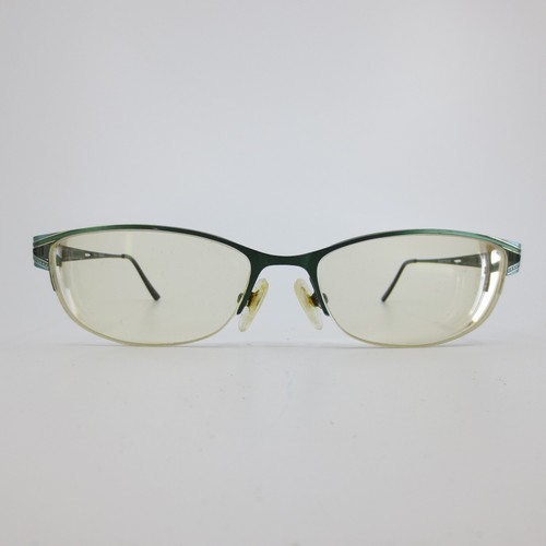 Danze green semi-rimless oval eyeglass frames with silver lenses and engraved feather motifs on the front corners.