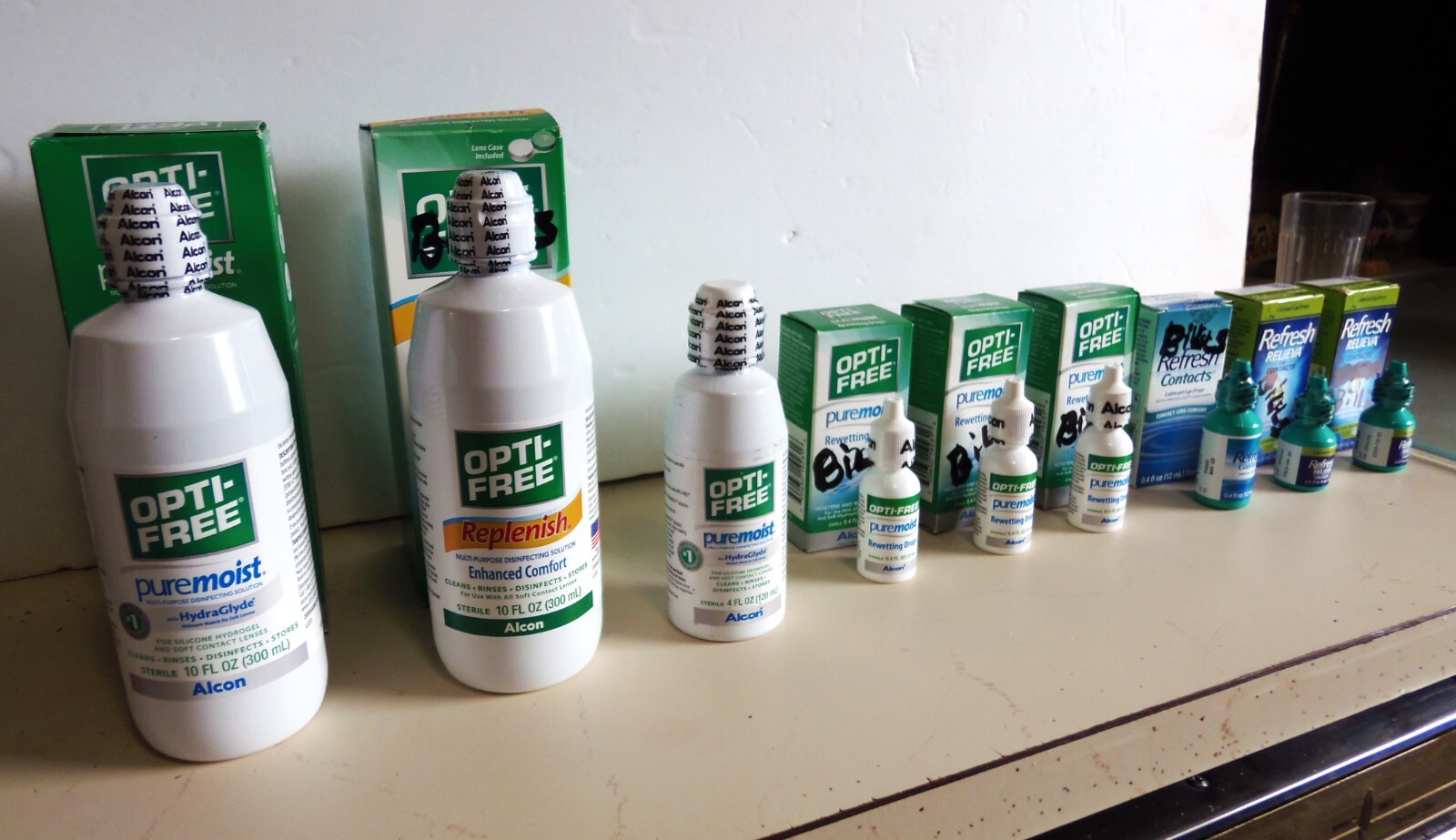 9 BOTTLES   CONTACT SOLUTION: OPTIFREE PUREMOIST & REPLENISH and REFRESH BRANDS