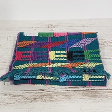 Handwoven Colorful Table Runner Teal background with lots of other primary color