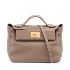 Hermès sacks Le Vingt Cuatre 24/24 29 TOGO X VOSWIFT Etoupe Gold Metal Fittings