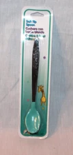 NEW IN PACKAGE VINTAGE NURSERY NEEDS FEEDING SOFT TIP SPOON GREEN
