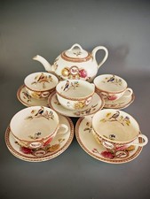 Antique tea set of teapot, 5 cups and 9 saucers. Hand painted. 19s century.