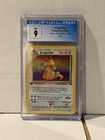 Dragonite Fossil 1st Edition Holo 4/62 POKEMON CGC 9 MINT