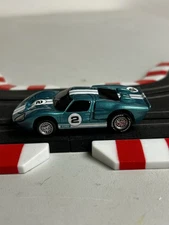 NEW CUSTOM PAINTED TEAL BLUE RESIN FORD GT40 ON NEW AFX MEGA G+ CHASSIS
