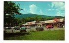 Ludlow VT Central Plaza Okemo Mountains in background VTG postcard UNP