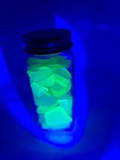 4.86oz of Uranium Beach Glass In A 1 x4" Bottle.