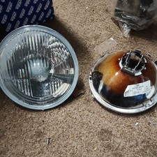 HELLA Halogen-Insert 7" Headlight H4 12V (EU - Left Hand Drive)