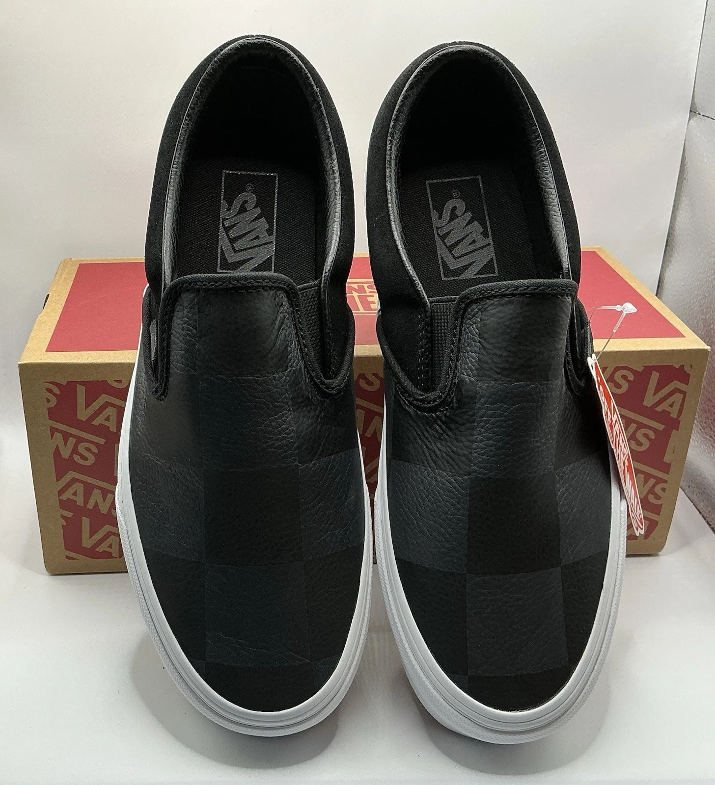 Vans black checkerboard slip on Leather/ Suede Men’s 7.5 Women’s 9 New In Box