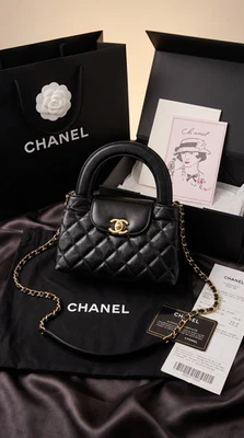 Sac Chanel mini noir matelassé cuir – modèle top handle – chaîne dorée – état ne - Photo 1/4