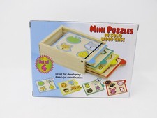 Etna Products Set of 4 Mini Puzzles in Solid Wood Case - New