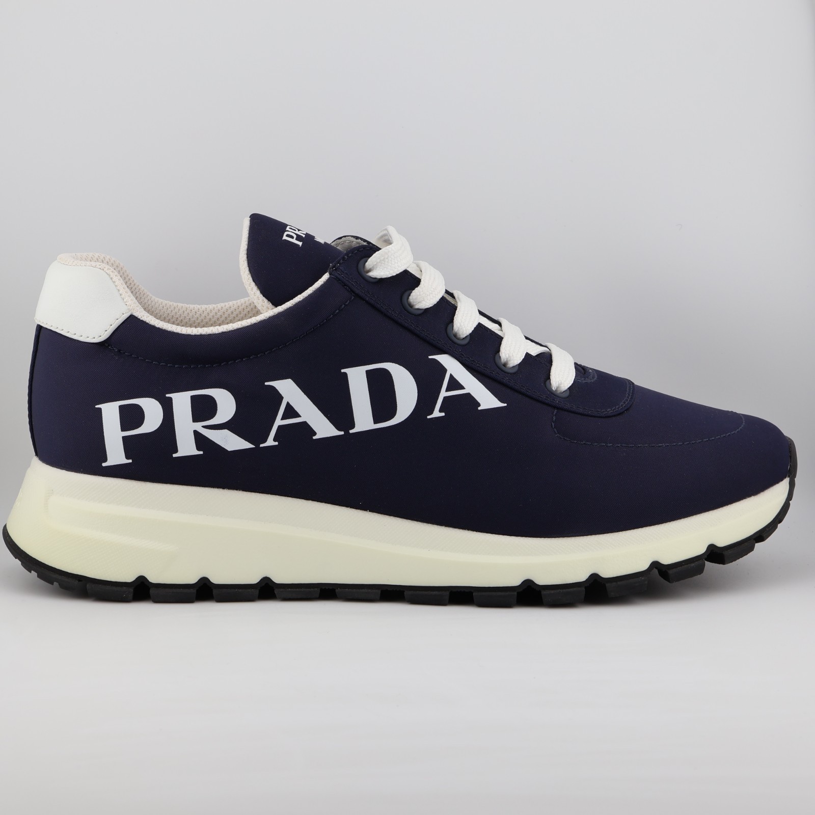 Prada Printed Nylon Gabardine Logo Sneakers in navy and White Size 7