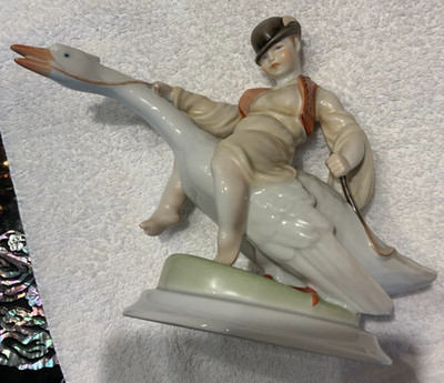YOUNG VINTAGE BOY FROM HEREND, HUNGARY, RIDING A GOOSE, HAND PAINTED 8 1/2'' TALL