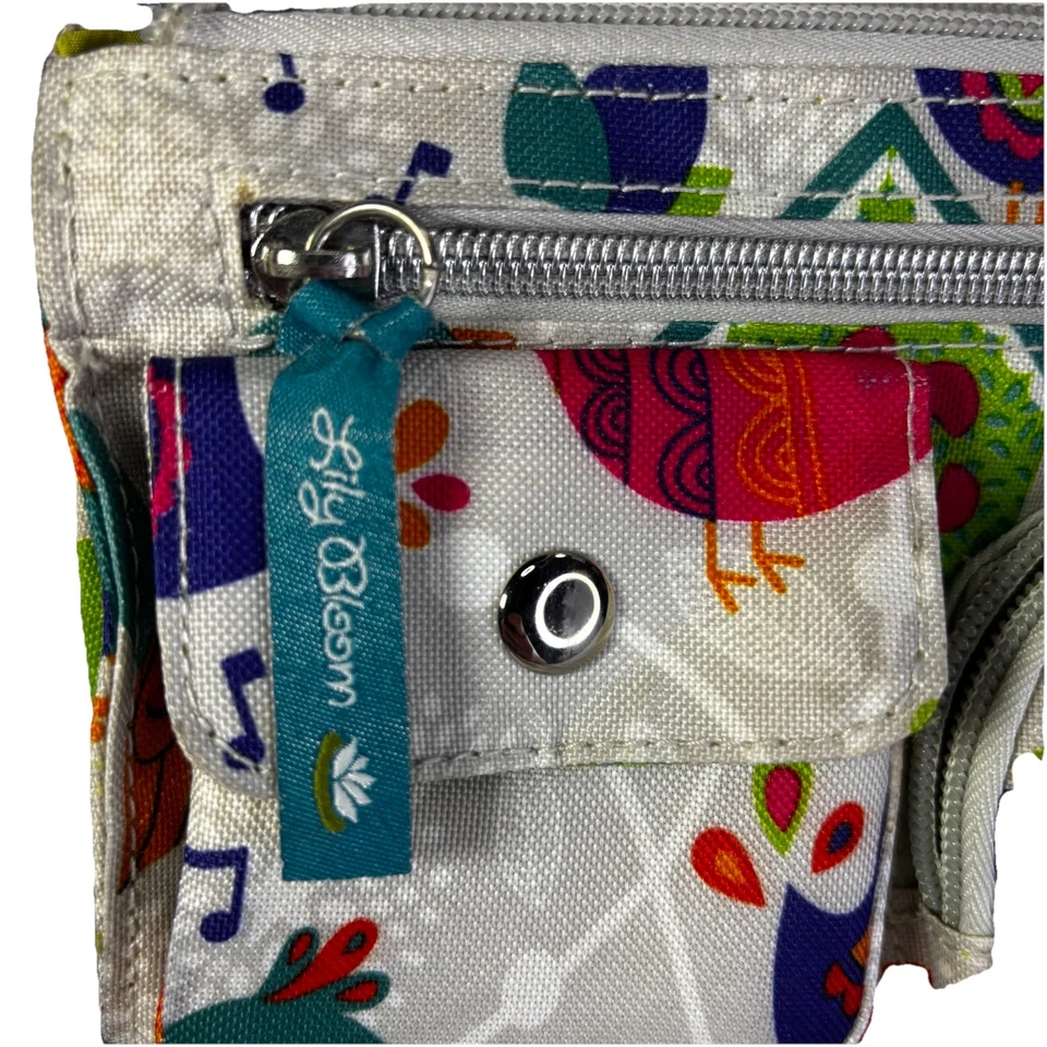 Muñequera/cartera Lily Bloom Love Birds para mujer con múltiples bolsillos y secciones Foto 2 de 4