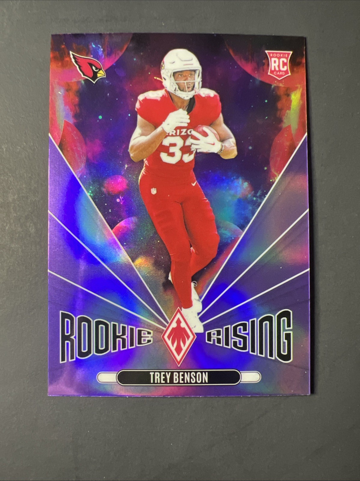 2024 Panini Phoenix - Rookie Rising Trey Benson #RR-TBN Purple (RC) Cardinals