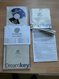 Sega Dreamcast Console And Two Controllers, One Memory Card