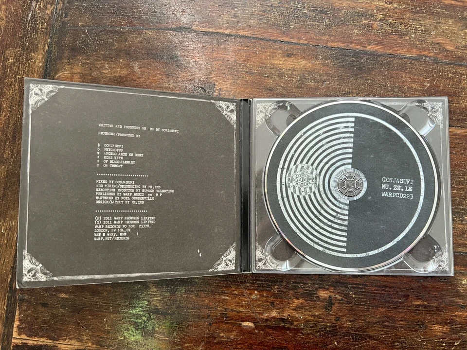 GONJASUFI - MU.ZZ.LE - CD - Warp Records - Bild 2 von 3