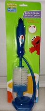 SESAME STREET BEGINNINGS COOKIE MONSTER BOTTLE & NIPPLE BRUSH WITH STAND.