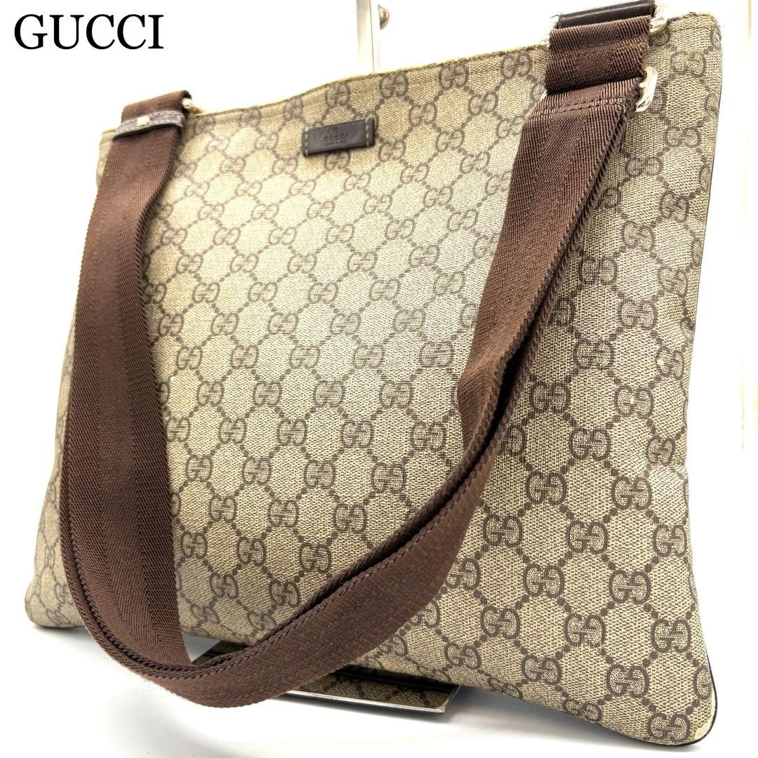Sac à bandoulière GUCCI cuir pvc motif Gg beige