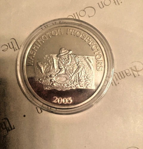 2005 Washington Prospector 1 oz.troy .999 silver round with capsule. Rare.