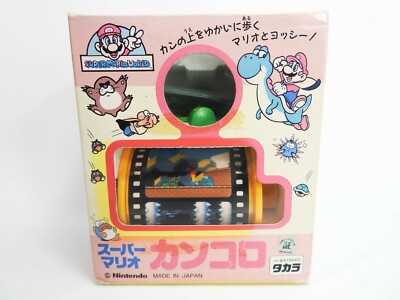 Super Mario World - ''Can Koro'' Wind Up Spinning film toy Takara Nintendo Japan