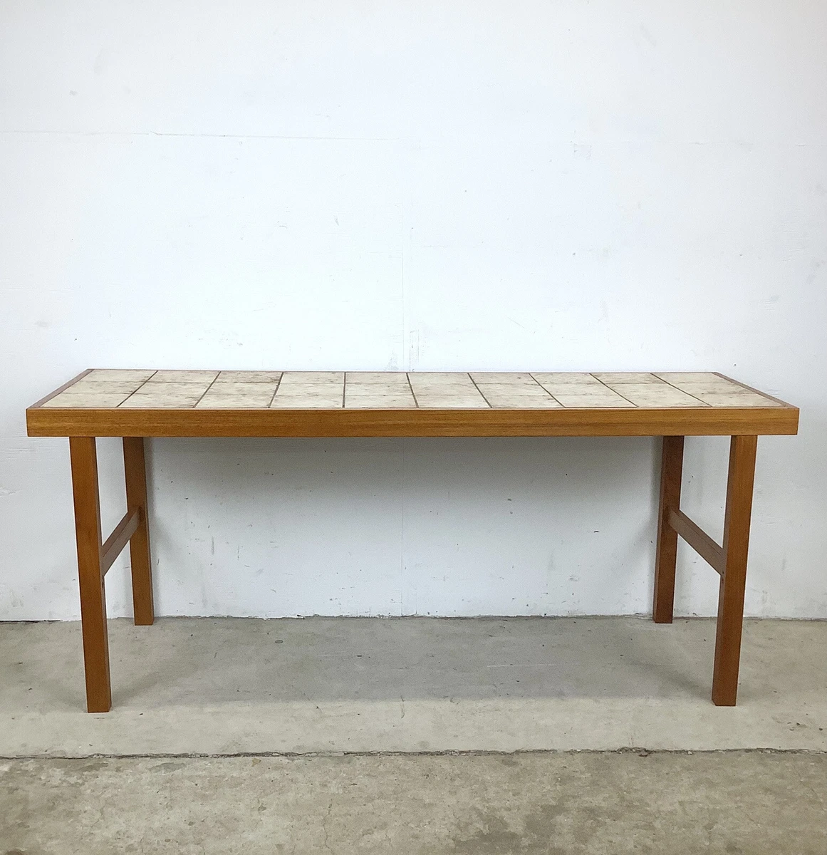 Tiled outlet console table