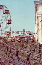 THE STEEPLECHASE AND FERRIS WHEEL in Steeplechase Park, CONEY ISLAND, NEW YORK