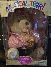 Vintage Musical Terri bear. Terri bear has 6-8 tunes still in box.
