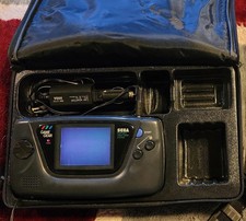 Sega Game Gear Console Lot w/ Game-Case  Powers on but doesn  t work games 