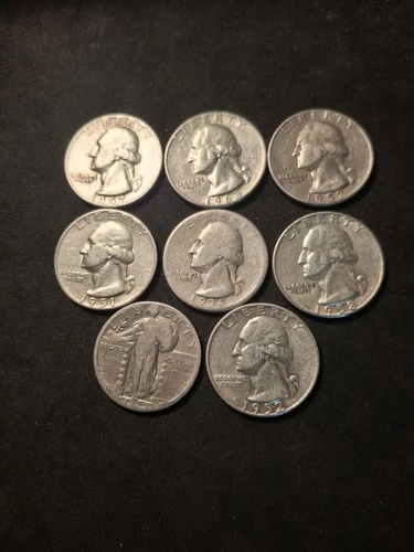 8xsilver quarters.7washington.1walking liberty.2.00 face value.good condition.