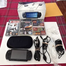 Sony PSP 1001 k / 98500 Value Pack, 4GB MSD, 12 Movies, 3 Games bundle