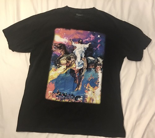 Jesus Riding a T-Rex Dinosaur Shooting 