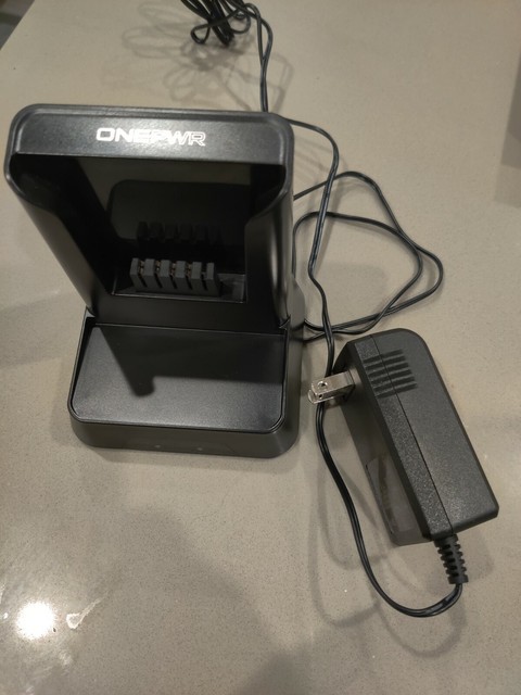 vax onepwr battery charger defective