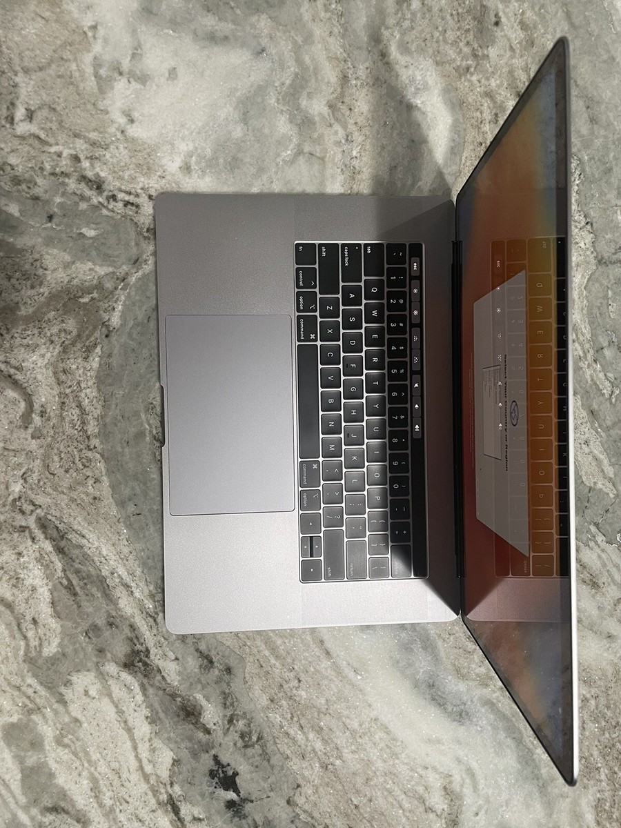 MacBook Pro (15-Inch, 2019) 256GB SSD, Intel i7 16GB A1990 Touch