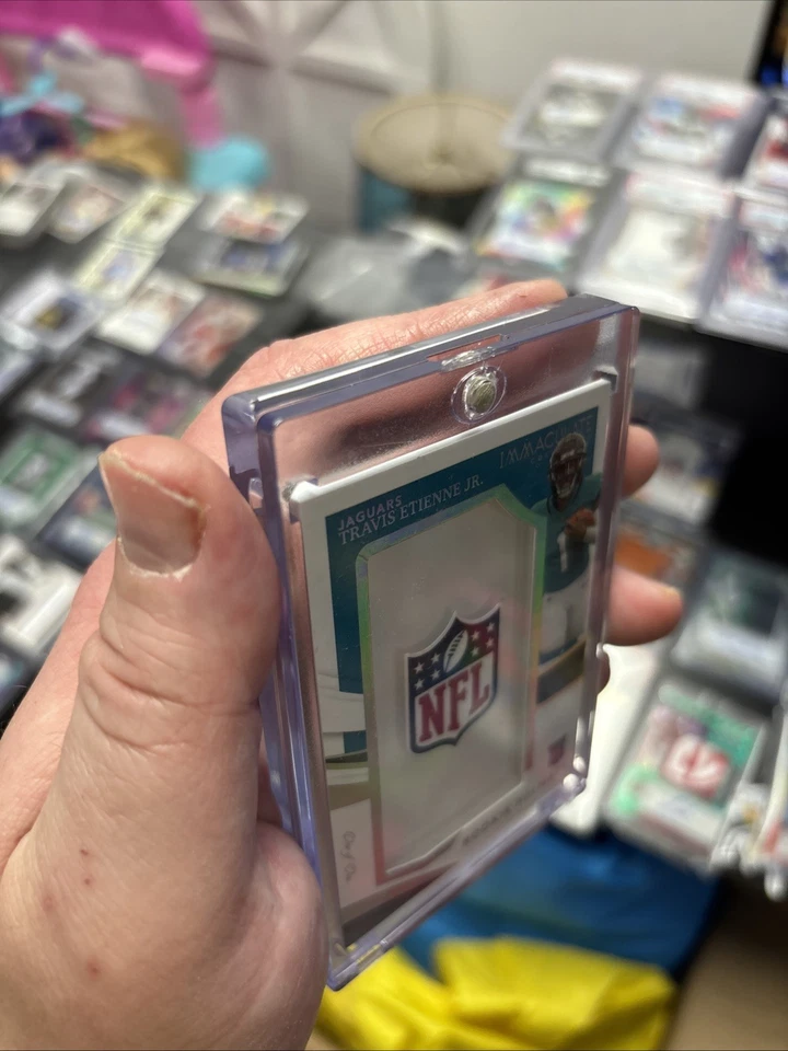 2021 Panini Immaculate Travis Etienne Jr. Rookie Helmets NFL Shield 1/1 RC - Image 4 of 4