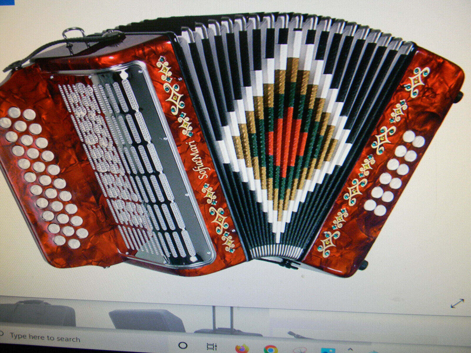 Accordion-- Diatonic button accordion and Dolly case.
