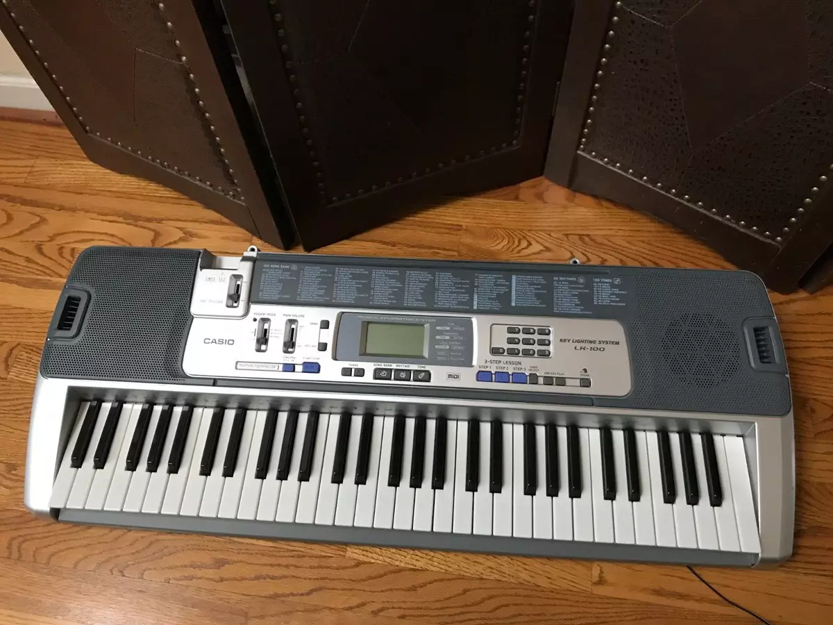 Casio LK 100 Lighted 61 Key Keyboard with LCD Display w Adapter Manual