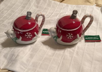 A Pair Of  Sleigh Bell Bistro Ceramic Cat-Shaped Christmas Mug W/Lid, 18 Oz.