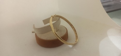 Bracciale Ovale rigido alla schiava oro giallo 18 kt lucido con incisioni donna - Foto 2 di 17
