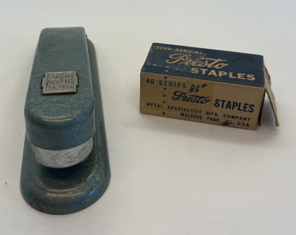 The 'DeLuxe' name is earned — a Presto stapler complete with its original box and staples, a perfect little time capsule from post-war American manufacturing.