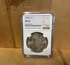 1884-O Morgan Silver Dollar MS65 $1 NGC New Orleans