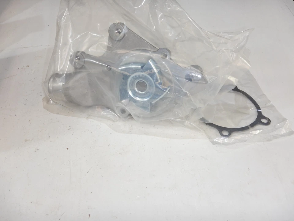 Bomba de agua nueva OMIX para Jeep Wrangler YJ TJ Cherokee XJ 91-01 17104.07 Foto 4 de 4