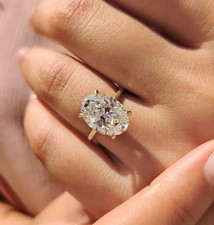 3.90 Ct Oval Cut Solitaire White Moissanite Wedding Ring 14K Yellow Gold Finish